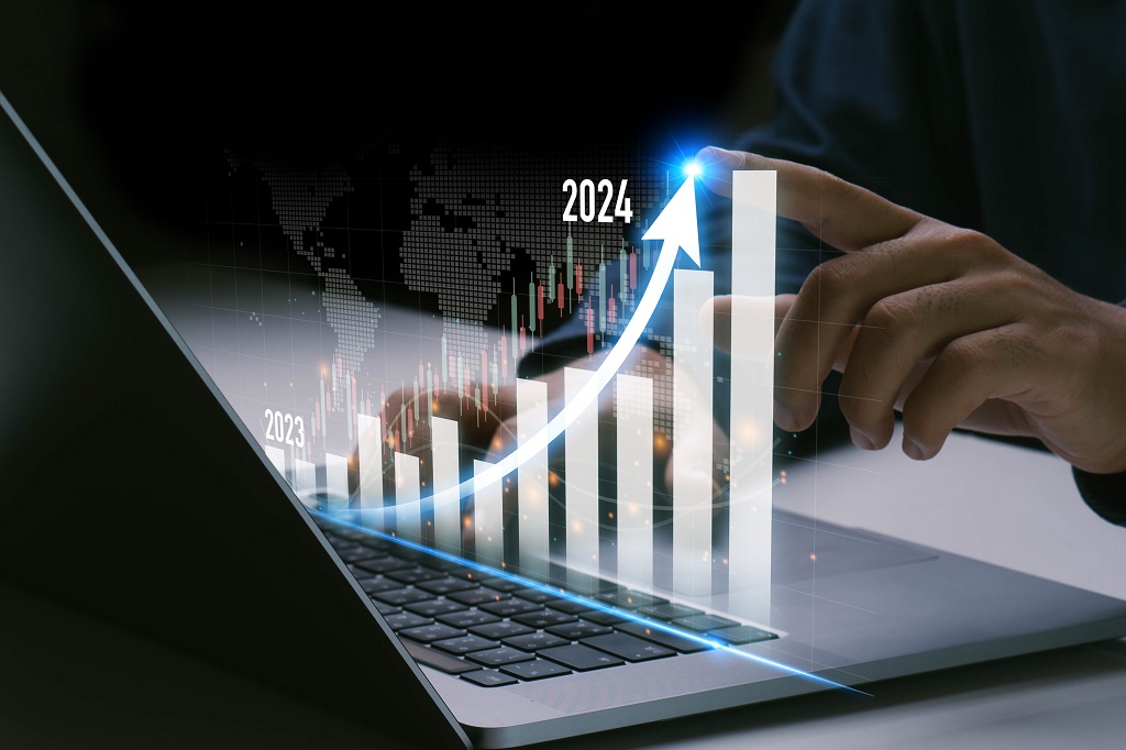 Business development to success.Businessman hand pointing arrow up and graph.Profit and growing growth plan.Businessman analyzes profitability.positive indicators in 2024. Business development to success.Businessman hand pointing arrow up and graph.Profit and growing growth plan.Businessman analyzes profitability.positive indicators in 2024.
